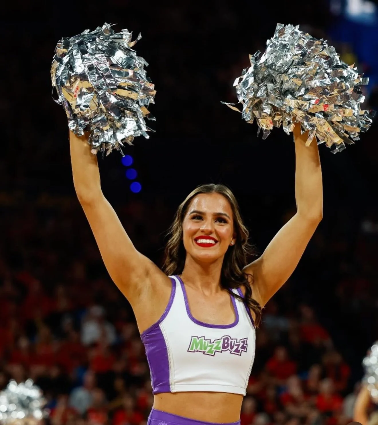 KnightCorp Dancers member, pompoms raised, Perth Wildcats home game, RAC Arena
